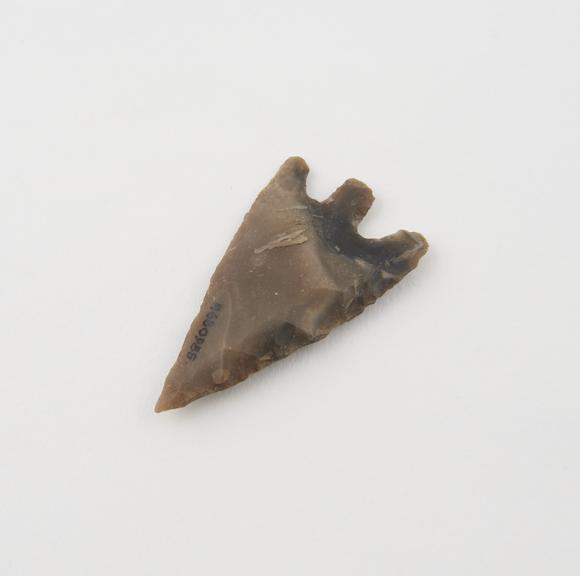 Flint arrowhead, with primary and secondary barbs