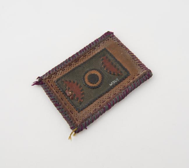Amulet consisting of ornamental leather case, polychrome
