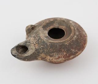 Graeco-Egyptian red pottery oil lamp