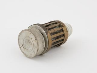 Cylindrical lamp holder with metal grill and glass lightbulb inside