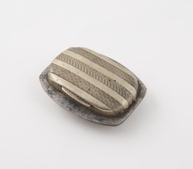 Tinder-box (length 1 3/4 in) of nickel; oval