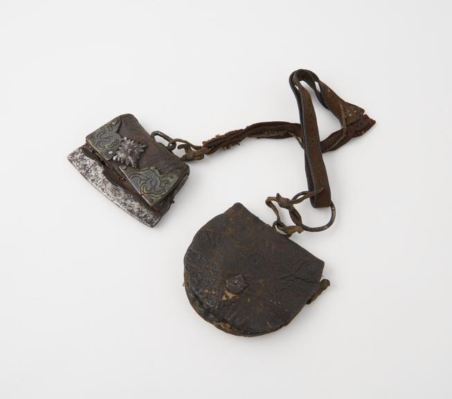 Chuckmuck, leather with copper and iron decorations.