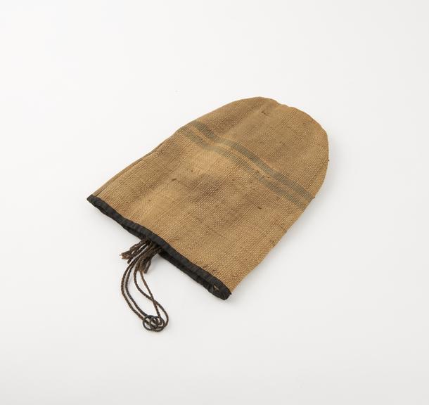 Tinder-bag (depth 7 1/4 ins) of some buff-coloured finely-woven