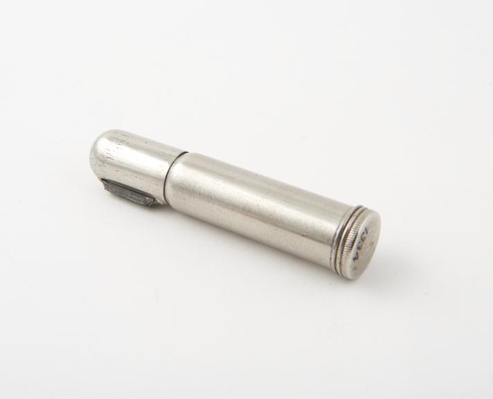 A Lighter (length 3 1/4 ins) made from, or like