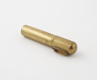 One of three lighters  of thin reeded brass