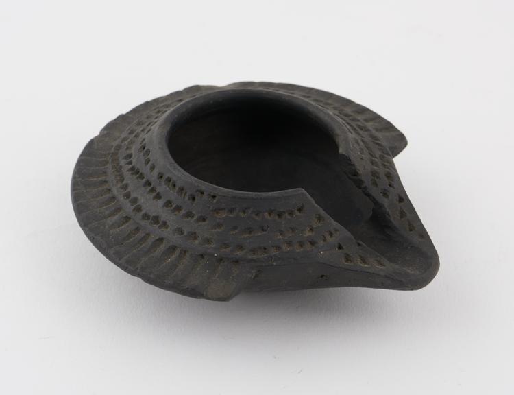 Black pottery lipped dish