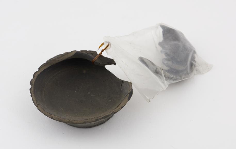 Black pottery lipped dish, Kashmir