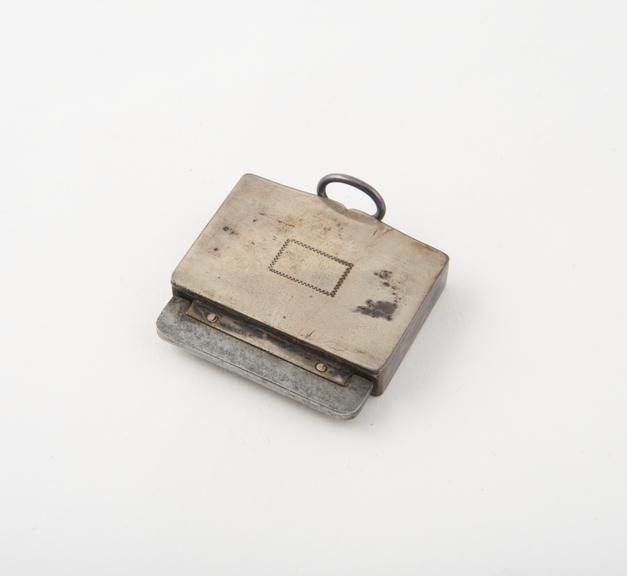 Tinder-box (length 1 5/8 in) of silver; rectangular