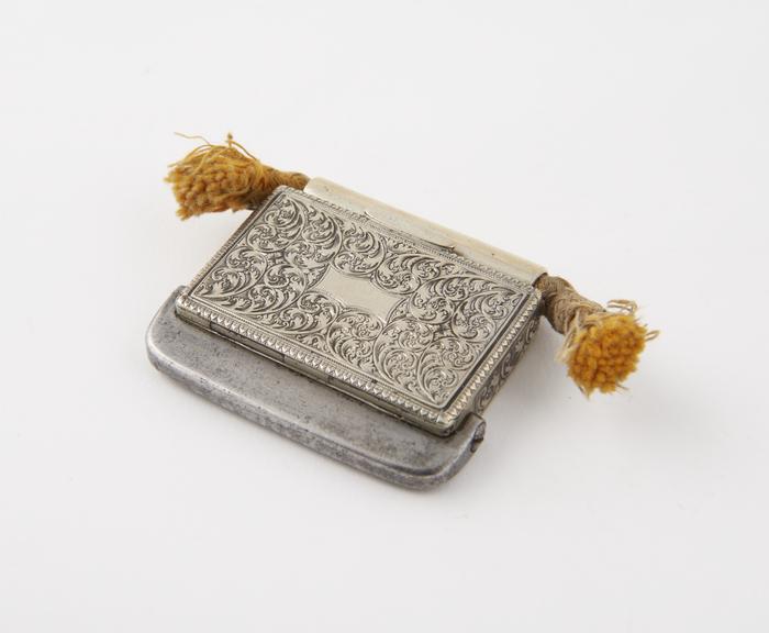 Tinder-holder (length 2 ins) of silver; rectangular