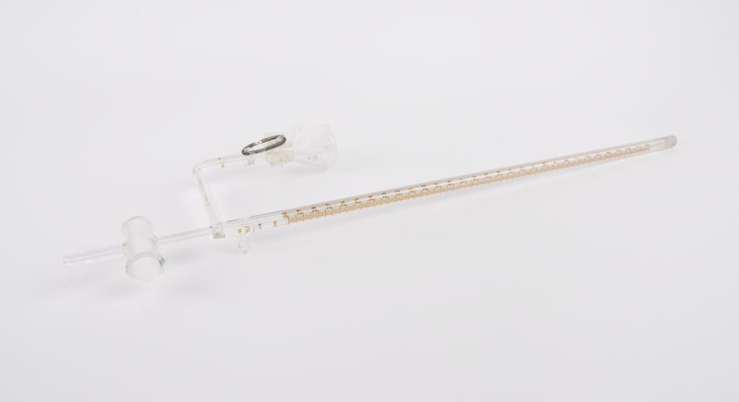 Burette with attached vessel