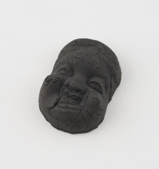 Miniature pottery mask