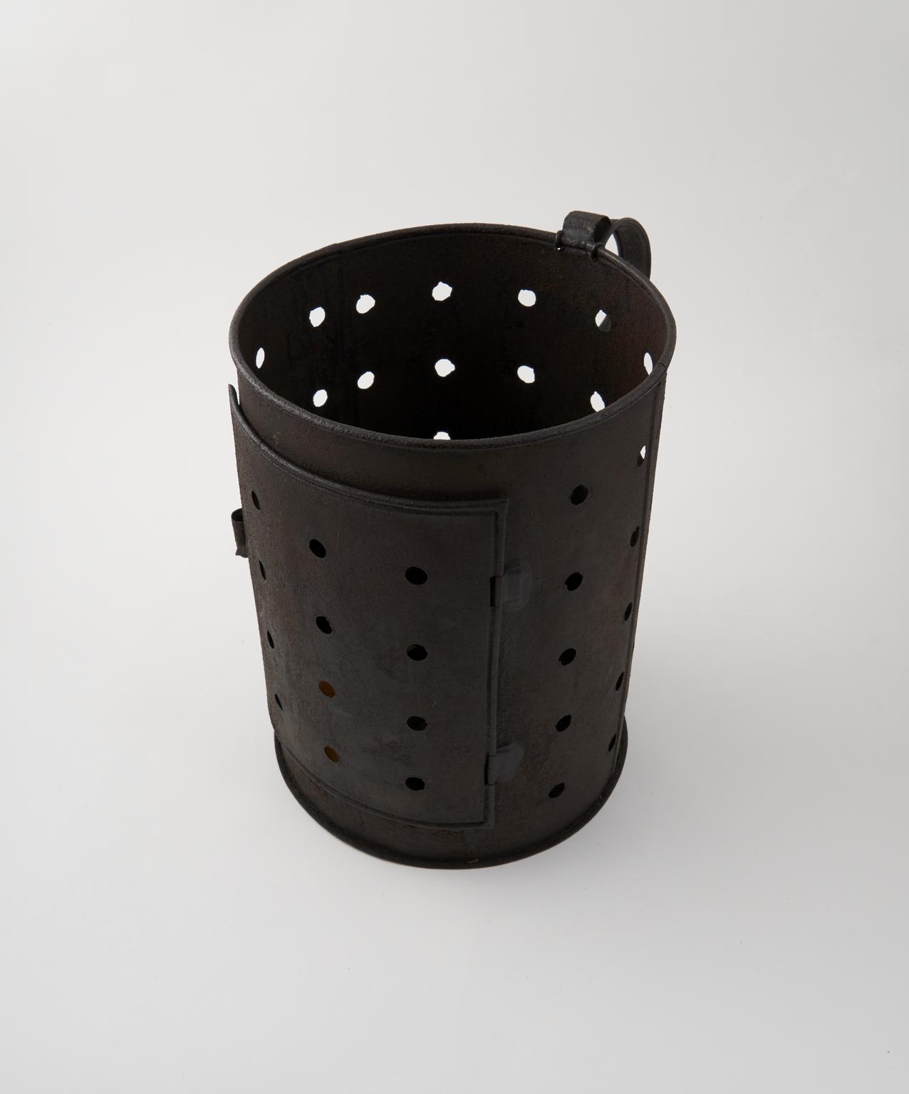 Perforated tin case shield for candle | Science Museum Group Collection