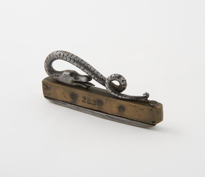 Fire-steel (length 3 ins) of very uncommon type; steel very