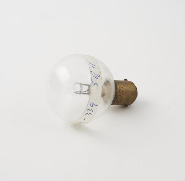 Car light bulb with 2 filaments each 6 volts, 3 & 21 watts