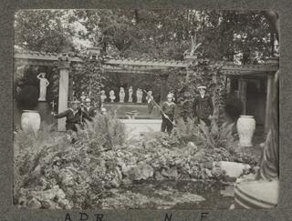 Part of the garden with carved marble bath, statues and Pagoda