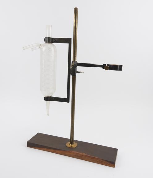 Double retort stand, glass tube still and two flasks from Dr