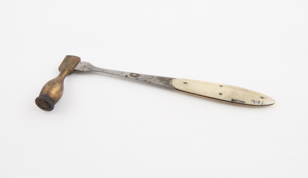 Percussion hammer, brass, steel and ivory, 19th century