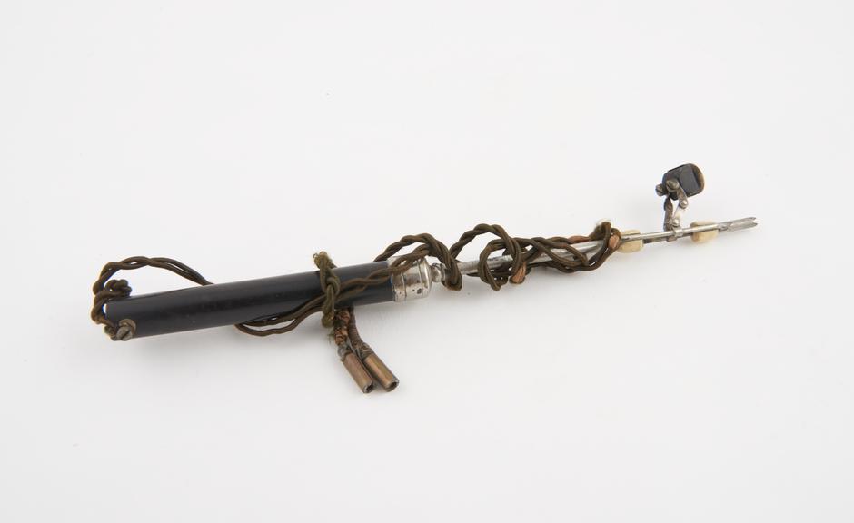 Unidentified electrical instrument, steel and vulcanite