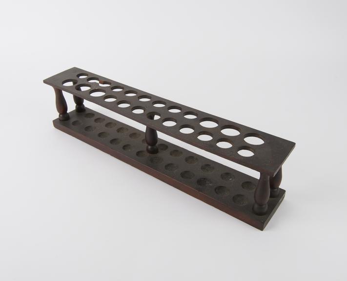 Mahogany test tube rack made by Hargreaves, Manchester