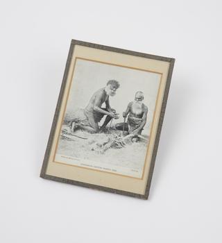 Illustration of a native of Australia making fire with a fire-drill