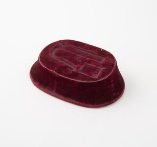 Plush base for Sir J. Franklin's fire steel