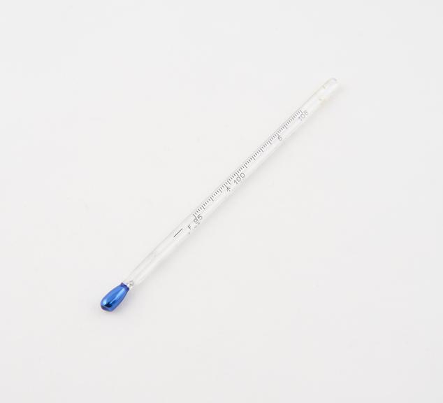 Clinical thermometers, with pear-shaped blue bulb, lens stem