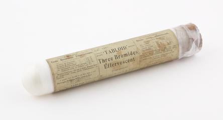 Glass tube with cork stopper containing "Tabloid" brand tablets of three bromides effervescent