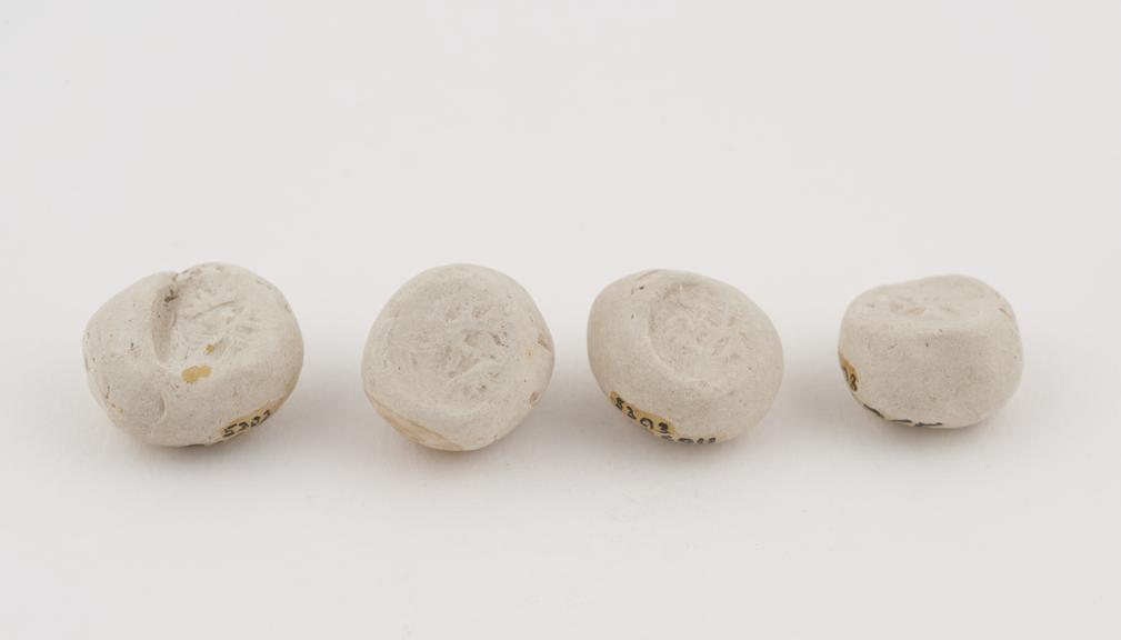 4 white terra sigillata, roughly spherical, from Malta