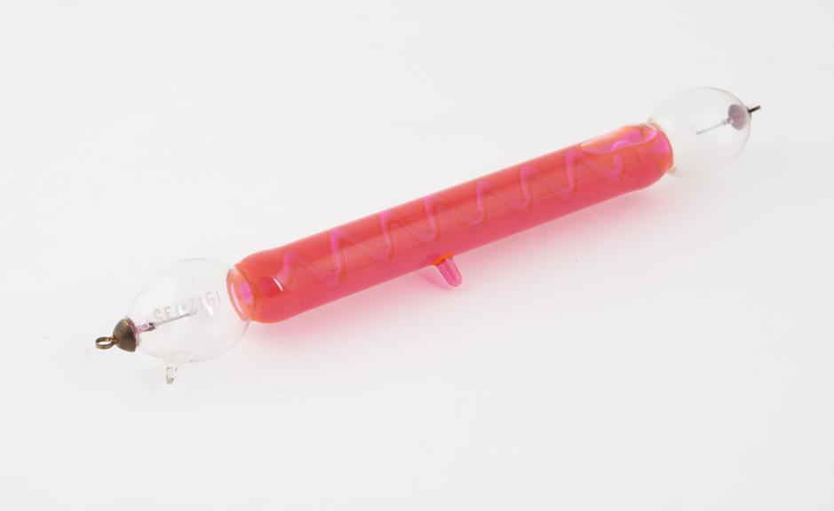 Geissler tube with internal tube surrounded by red liquid