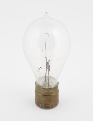 One of eighty-six early incandescent lamps.  Arch filament