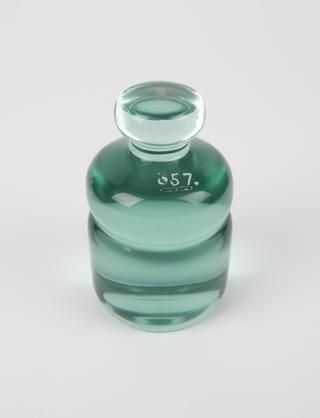 One of eight glass Experimental Metric weights of special shape for 1 kilogramme