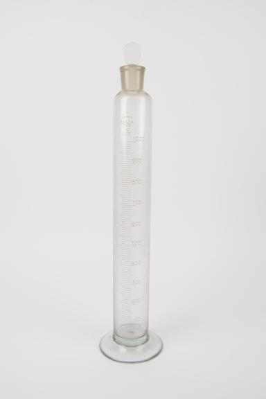 One of two measuring cylinders, B.S. 604, to hold 1000 ml