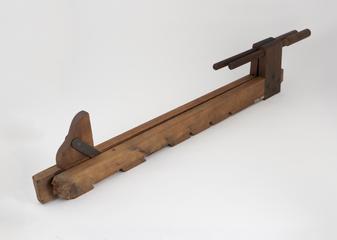 A pair of wooden joiner's cramp as used by a coachmaker