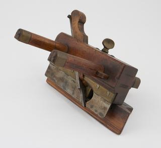 A Plough Plane with screw adjustable plough depth