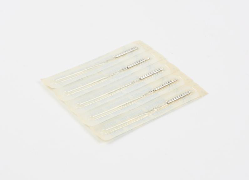 Plastic pack containing 5 pairs of stainless steel disposable acupuncture needles