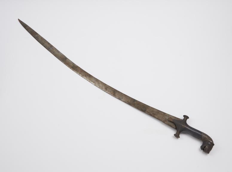 Curved sword with lion head hilt