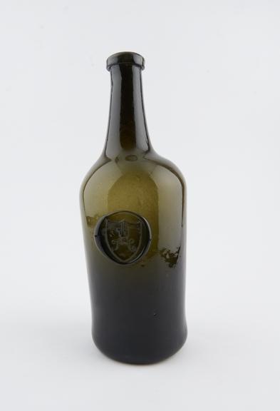 One of six old wine bottles