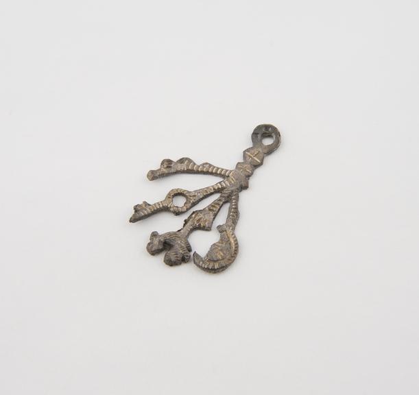 Silver amulet and cimaruta, in the form of a sprig of rue