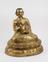 18th or 19th century Tibetan gilt copper figure of a Lama