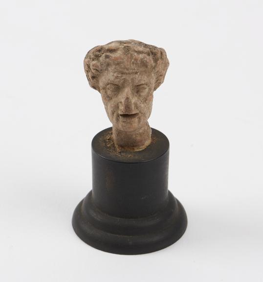 Female head, terracotta, probably Roman, 200BC to 200AD