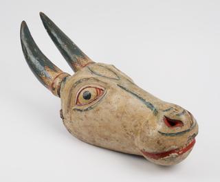 Painted horned bull mask