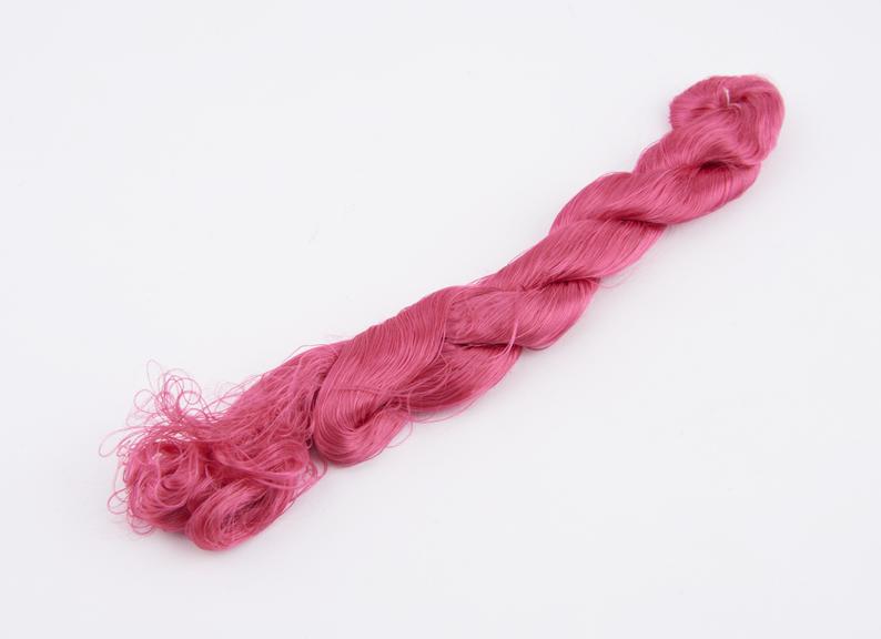 Bright pink viscose skein with associated label Mr Heaven