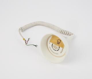 One of four white hear phones from installation of human animated figures, Cleveland Health Museum, Ohio, United States, 1965