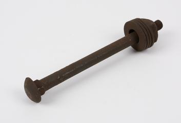 Metal screw with four washers and a square bolt