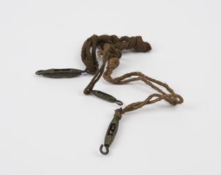 Three small pieces of rope with metal hooks attached