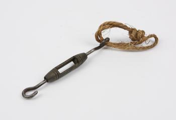 Tied loop of rope with a metal hook attached