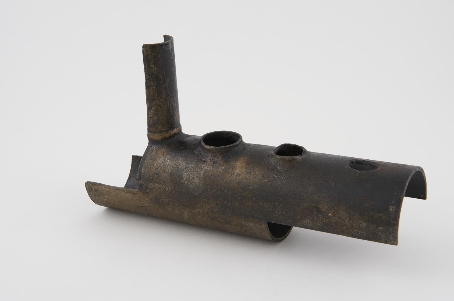 Part sectioned pipe with joint, showing improved streamlined branch ...