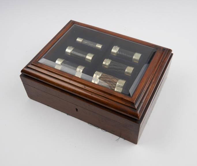 Glazed case containing specimens of Atlantic cables, 1857/8