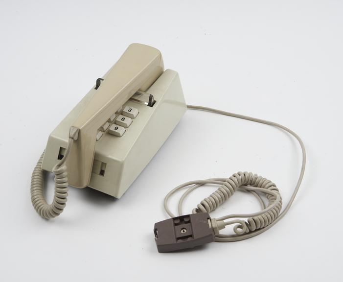 Grey 'Trimphone' telephone, one of two