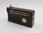 This is a rare short-wave radio receiver with a leather case